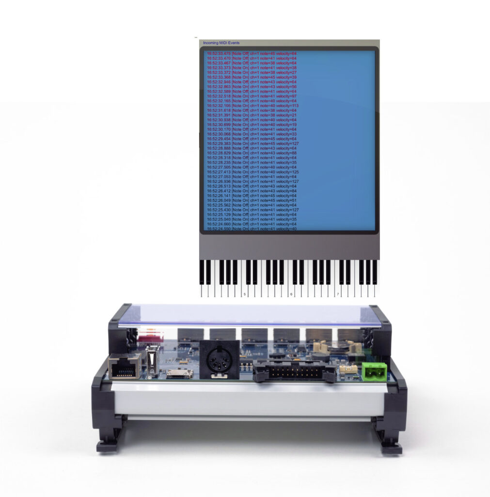 Prüfaufbau mit Orgelmanual und großem Anzeigedisplay auf einem Elektronik-Chassis